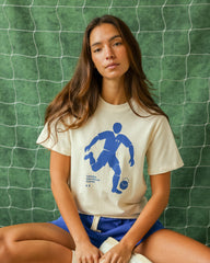 International Friendly Mascot Tee Natural - Unisex